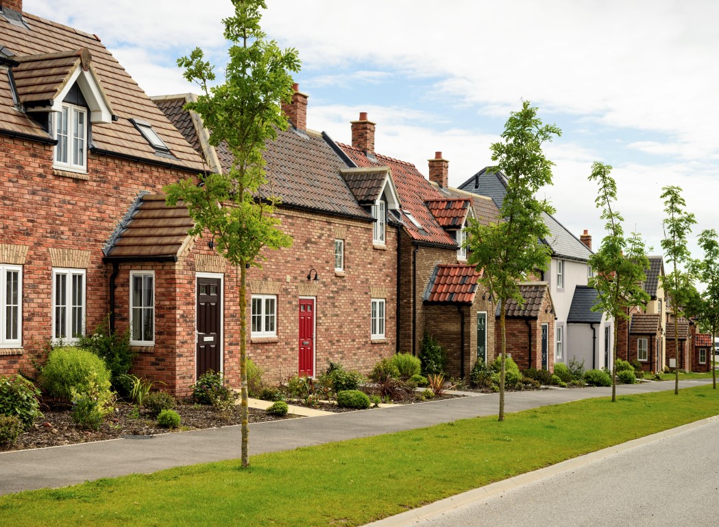 Recently built brick houses of traditional design on a housing development in Northern England.